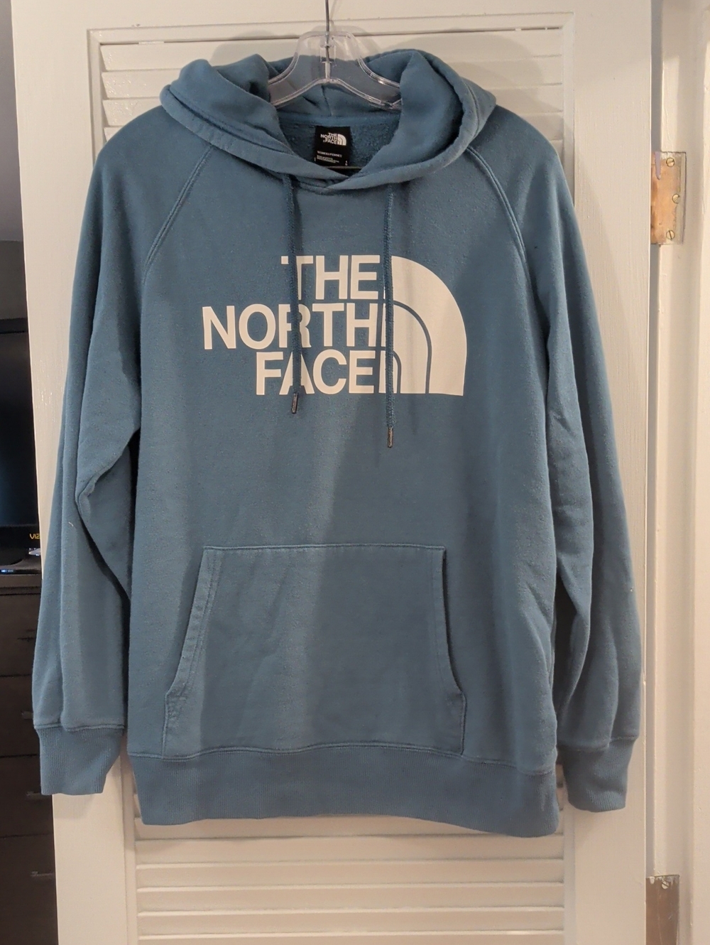 The North Face Blue Pullover Hoodie with White Logo